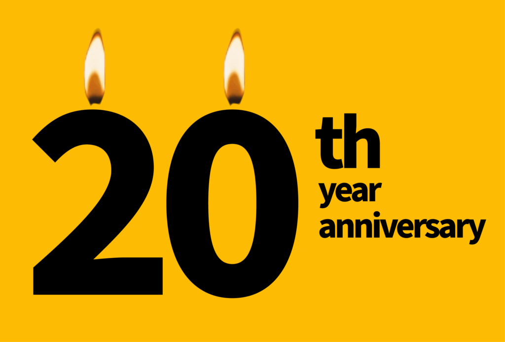 A yellow image with black writing saying '20th Year Anniversary'